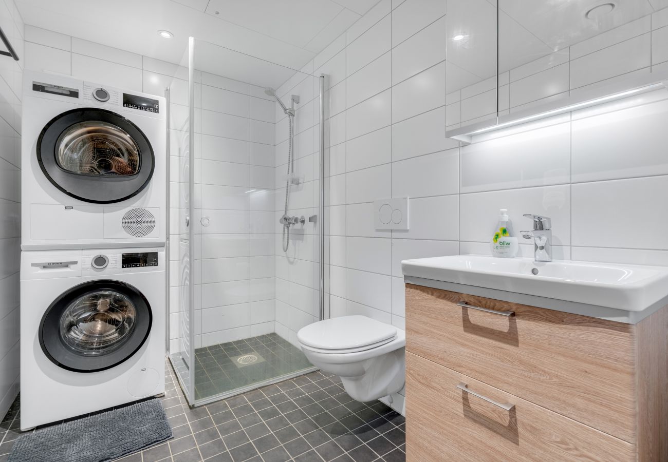 Leilighet i Tromsø - Moderne sentral toppleilighet med utsikt til fjellheisen og Tromsdalstind